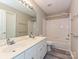 Neutral bathroom with double sink vanity and a shower-tub combination at 6112 Swanston Dr, Charlotte, NC 28269