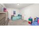 bedroom with carpet, closet and 2 beds with a colorful decor at 710 Anglin Forest Way, Charlotte, NC 28214
