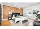 Chic bedroom with herringbone wood accent wall, pendant lights, and cozy decor at 728 Brookside Ave, Charlotte, NC 28203