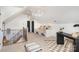 Bonus room with built in seating area, desk and decorative metal railing at 728 Brookside Ave, Charlotte, NC 28203