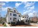 Elegant white brick homes offer modern luxury with distinctive round windows and clean lines at 728 Brookside Ave, Charlotte, NC 28203