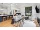 Open-concept living space features a kitchen, breakfast nook, and a stylish bar area at 728 Brookside Ave, Charlotte, NC 28203