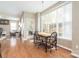 Bright dining area with large windows and a table perfect for Gathering meals at 7353 Sedgebrook W Dr, Stanley, NC 28164