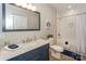 Bathroom features a marble countertop vanity, framed mirror, and a shower-tub combination at 8225 Long Island Rd, Catawba, NC 28609