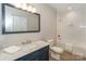 Bathroom featuring a vanity, commode and tub with shower at 8225 Long Island Rd, Catawba, NC 28609