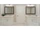Bright bathroom with double vanity, mirrors, and marble flooring at 8225 Long Island Rd, Catawba, NC 28609