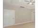 Bedroom with white trim, doors, and light hardwood flooring at 8225 Long Island Rd, Catawba, NC 28609