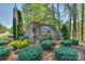 Stone sign for 'The Summit at Lake Norman' with landscaping and an American flag adds community charm at 8225 Long Island Rd, Catawba, NC 28609