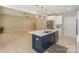 Open kitchen featuring stainless steel appliances and island, adjacent to a living area at 8225 Long Island Rd, Catawba, NC 28609