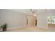 Spacious living area with light hardwood floors and bright natural light from the large windows at 8225 Long Island Rd, Catawba, NC 28609