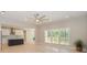 Bright open-concept living area featuring lots of natural light and a view into the kitchen at 8225 Long Island Rd, Catawba, NC 28609