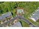 An aerial view showcasing a community pool surrounded by lush landscaping at 831 Daly Cir, Fort Mill, SC 29715
