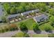 An aerial view of a neighborhood with mature trees and well-kept lawns at 831 Daly Cir, Fort Mill, SC 29715