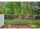 A fenced backyard with a brick patio offers a private outdoor space at 831 Daly Cir, Fort Mill, SC 29715
