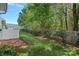 A private backyard with lawn area and brick patio provides a secluded retreat at 831 Daly Cir, Fort Mill, SC 29715