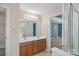Bright bathroom featuring a double sink vanity and an adjacent bedroom view at 831 Daly Cir, Fort Mill, SC 29715