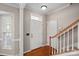 Inviting foyer featuring hardwood floors and a staircase with wooden railings at 831 Daly Cir, Fort Mill, SC 29715