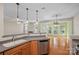 Open-concept kitchen with views of the spacious living area and natural light at 831 Daly Cir, Fort Mill, SC 29715