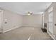 Spacious living room with fireplace, neutral carpet and natural light at 831 Daly Cir, Fort Mill, SC 29715