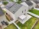 Aerial view of a backyard featuring vinyl siding, solar panels and a patio at 9612 Eagle Feathers Dr, Charlotte, NC 28214