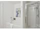 Bright bathroom featuring a soaking tub and a glass enclosed shower at 9612 Eagle Feathers Dr, Charlotte, NC 28214