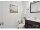 Charming powder room with modern fixtures and decor at 9612 Eagle Feathers Dr, Charlotte, NC 28214