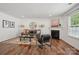 Comfortable living room with hardwood floors, a fireplace, a stylish rug, and designer decor at 9612 Eagle Feathers Dr, Charlotte, NC 28214