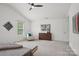 Bright main bedroom suite with vaulted ceilings and neutral decor at 9612 Eagle Feathers Dr, Charlotte, NC 28214