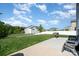 A well-maintained backyard with a patio, lush green lawn, and privacy fence at 1003 Dorsey Dr, Fort Mill, SC 29715