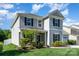 Charming two-story home with a well-manicured lawn and inviting front porch at 1003 Dorsey Dr, Fort Mill, SC 29715