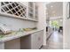 Stylish kitchen featuring a wine rack, granite countertops, and stainless steel appliances at 1003 Dorsey Dr, Fort Mill, SC 29715