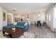 Open concept living area with kitchen and dining area with modern gray flooring at 1003 Dorsey Dr, Fort Mill, SC 29715