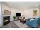 Cozy living area features a fireplace, television, and comfortable seating at 1003 Dorsey Dr, Fort Mill, SC 29715