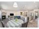 Open-concept living space with a fireplace, kitchen island, and cozy seating area at 1003 Dorsey Dr, Fort Mill, SC 29715