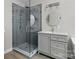 Updated bathroom featuring a glass enclosed shower, modern vanity, and brushed nickel fixtures at 1014 Sandbox Cir, Indian Trail, NC 28079