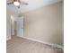 Light and bright bedroom featuring light colored walls and wood-look floors at 1014 Sandbox Cir, Indian Trail, NC 28079