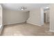 Spacious living room with wood-look floors and neutral paint at 1014 Sandbox Cir, Indian Trail, NC 28079