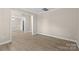 Spacious living room with light wood floors and neutral paint, creating a warm and inviting atmosphere at 1014 Sandbox Cir, Indian Trail, NC 28079