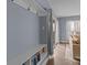 Hallway featuring a built-in bench with storage and a sliding glass door to the living room at 1109 E Morehead St # 22, Charlotte, NC 28204