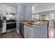 Kitchen with stainless steel appliances, granite countertops, and bar seating at 1109 E Morehead St # 22, Charlotte, NC 28204