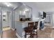 Kitchen with bar seating, stainless steel appliances, and granite countertops at 1109 E Morehead St # 22, Charlotte, NC 28204
