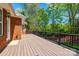 Inviting back deck of brick home with wooded backyard at 1126 Blowing Rock Cv, Fort Mill, SC 29708