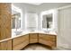 Bright bathroom featuring modern double vanity sinks with wood drawers at 1126 Blowing Rock Cv, Fort Mill, SC 29708
