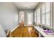 Bright bonus room featuring hardwood floors, large windows, and a doorway leading to another room at 1126 Blowing Rock Cv, Fort Mill, SC 29708