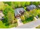 Beautiful brick home with lush landscaping, a two-car garage, and a well-maintained driveway at 1126 Blowing Rock Cv, Fort Mill, SC 29708
