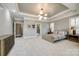 Large main bedroom with a bed, carpet, multiple windows, and recessed lighting at 1126 Blowing Rock Cv, Fort Mill, SC 29708