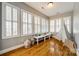 Bright playroom with hardwood floors, white plantation shutters, and a play tent at 1126 Blowing Rock Cv, Fort Mill, SC 29708