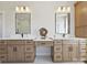 Elegant bathroom showcasing double vanities with modern fixtures, decorative mirrors, and ample countertop space at 1160 Springlake Rd, York, SC 29745