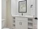Modern bathroom featuring a vanity with black hardware, open shelving, and sleek fixtures at 1160 Springlake Rd, York, SC 29745