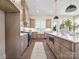 Bright kitchen with center island, modern appliances, and stylish finishes at 1160 Springlake Rd, York, SC 29745